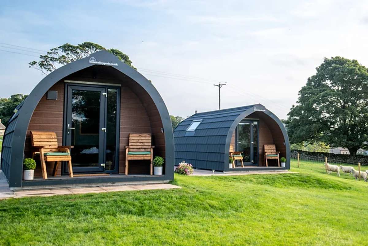 exterior-of-two-pods-at-coxons-farm-glamping-pods-in-the-daytime