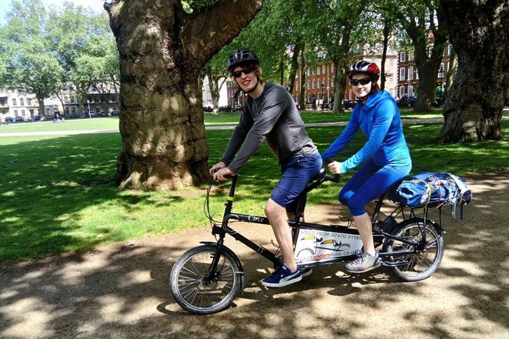 two-people-on-bristol-tandem-bike-hire-in-the-daytime